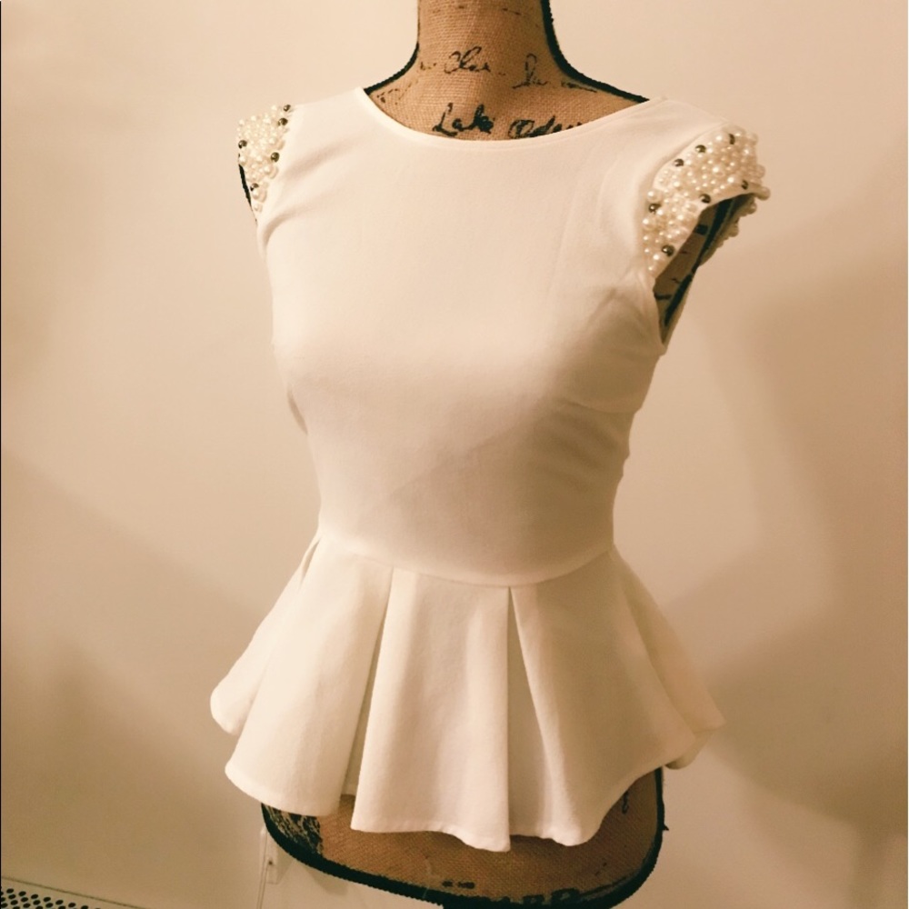 White peplum with pearl details S